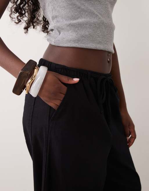 ASOS DESIGN – Svarta byxor i linnestil och dra på-modell, 4 av 5