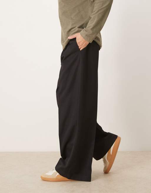 ASOS DESIGN – Svarta finbyxor med lediga ben, veck och synligt knapp, 3 av 5