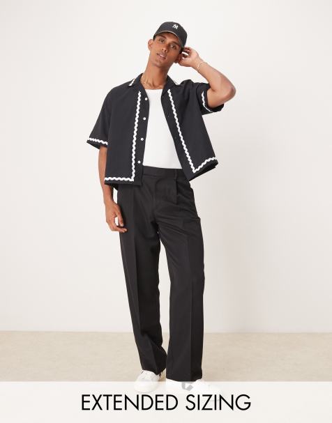 ASOS DESIGN – Svarta finbyxor med vida ben och veck framtill - view 1