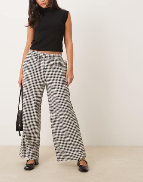 ASOS DESIGN – Svarta, ginghamrutiga byxor med vida ben - view 1