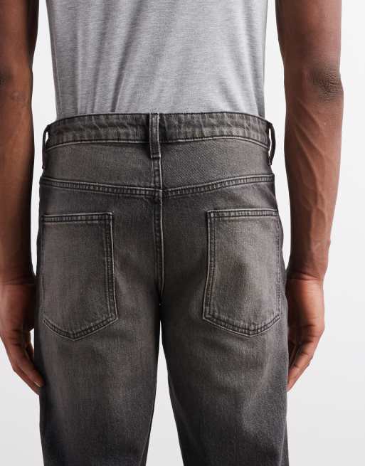 ASOS DESIGN – Svarta, gultonade, tvättade jeans med avsmalnande passform, 4 av 5