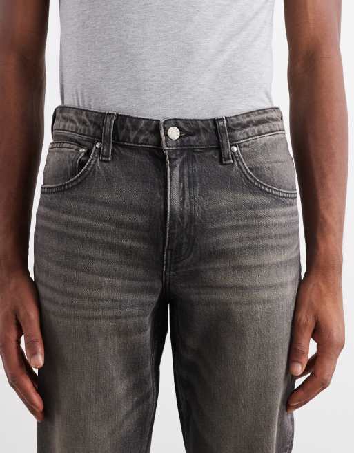 ASOS DESIGN – Svarta, gultonade, tvättade jeans med avsmalnande passform, 5 av 5