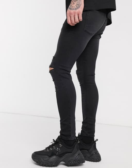 ASOS DESIGN – Svarta jeans i power-stretch med revor och spray on-passform, 2 av 4