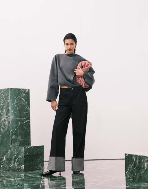 ASOS DESIGN – Svarta jeans med uppvikt kant - view 1