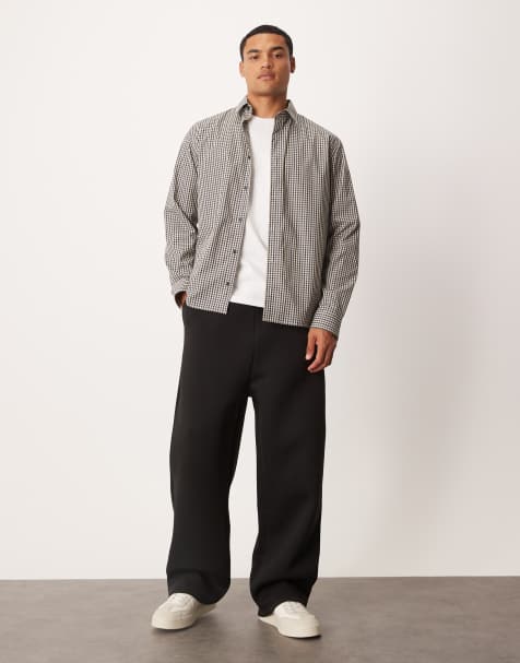 ASOS DESIGN – Svarta, kraftiga mjukisbyxor i scubaliknande tyg med vida ben - view 1