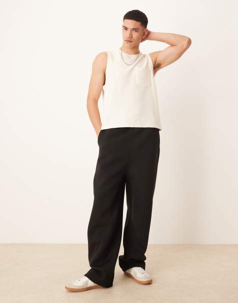 ASOS DESIGN – Svarta, kraftiga mjukisbyxor med vida ben i scubamaterial - view 1