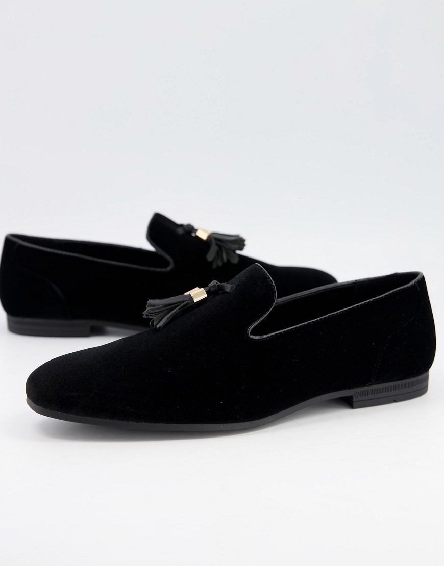 ASOS DESIGN – Svarta loafers i mockaimitation med tofsar