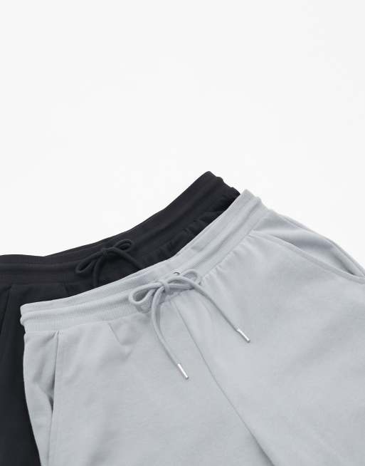 ASOS DESIGN – Svarta och gråmelerade mjukisbyxor med avsmalnande design, 2-pack, 2 av 4