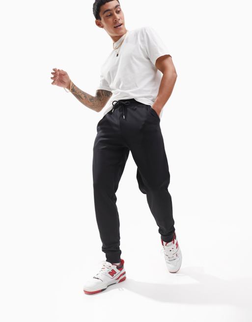 ASOS DESIGN – Svarta och gråmelerade mjukisbyxor med avsmalnande design, 2-pack, 3 av 4