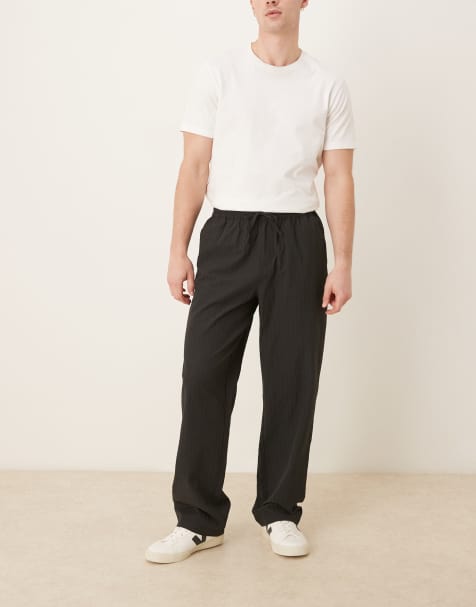 ASOS DESIGN – Svarta, randiga, baggy byxor - view 1