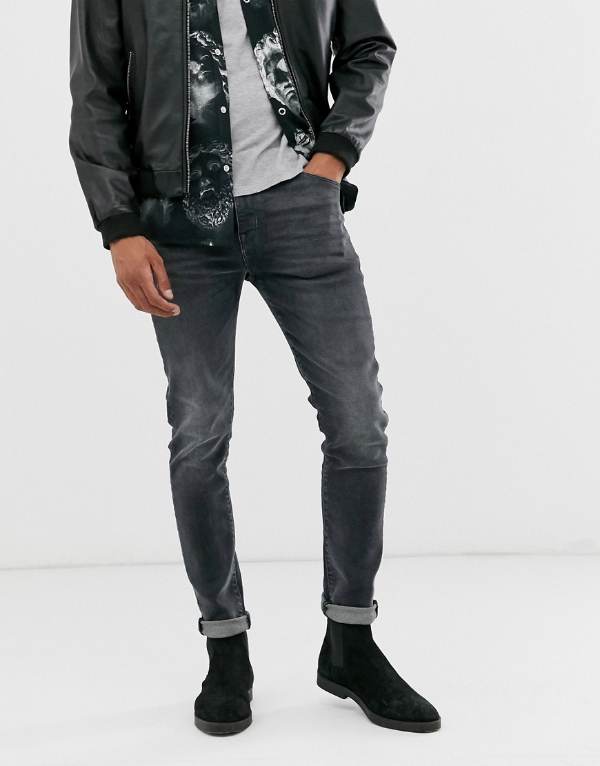 ASOS DESIGN – Svarta skinny jeans i vintagetvätt