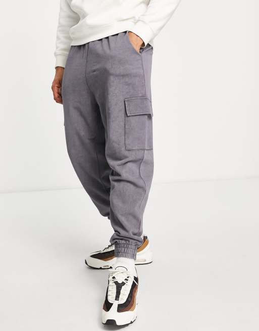 ASOS DESIGN – Svarta stentvättade mjukisbyxor med avslappnad och cargofickor