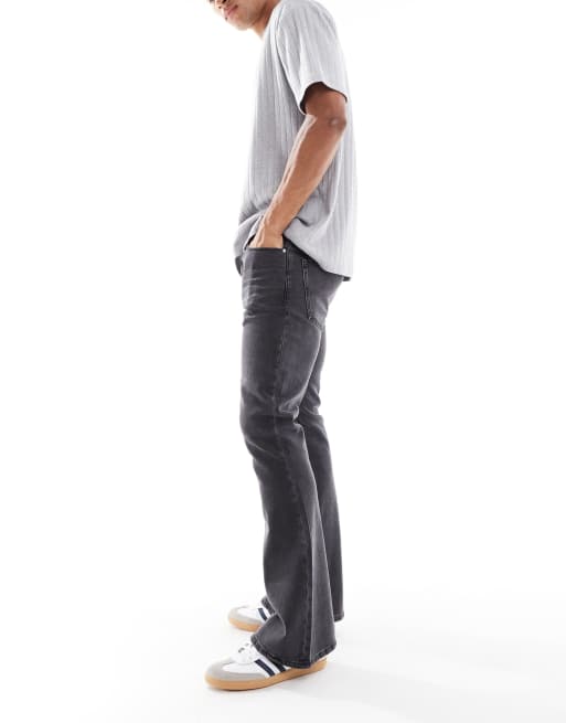 ASOS DESIGN – Svarta, stretchiga och utsvängda jeans med tvättad finish, 2 av 5