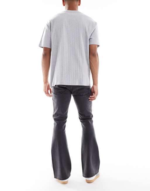 ASOS DESIGN – Svarta, stretchiga och utsvängda jeans med tvättad finish, 3 av 5