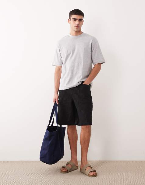 ASOS DESIGN – Svarta, strukturerade jeansshorts med ledig passform - view 1