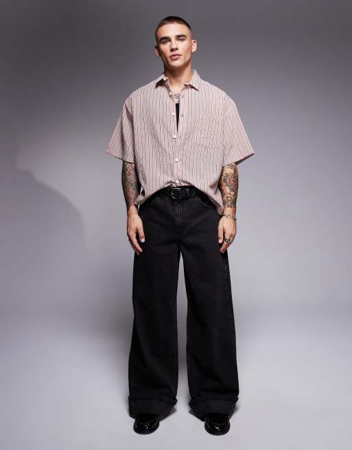 ASOS DESIGN – Svarta, tvättade och superbaggy jeans med uppvikta kanter