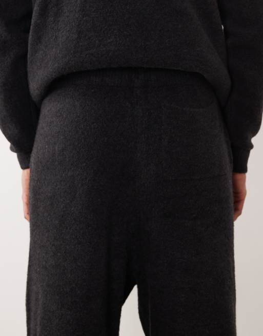 ASOS DESIGN – Svarta, tvättade, stickade mjukisbyxor i oversize med muddar och NYC-logga, del av set, 4 av 5