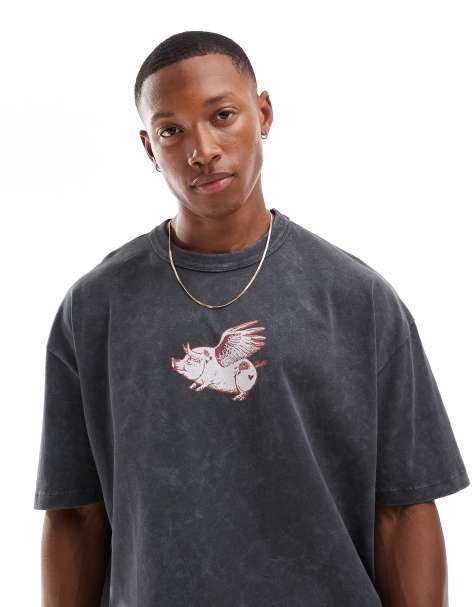 ASOS DESIGN – Svarttvättad t-shirt i oversize med tryck på bröstet - view 1