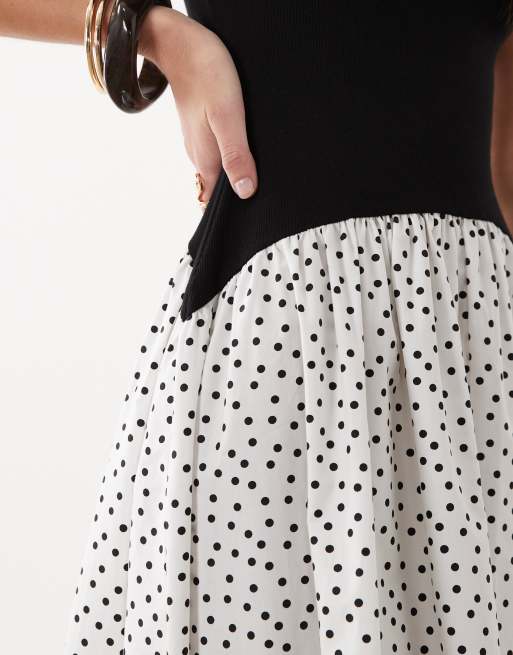 ASOS DESIGN – Svartvit, prickig, ärmlös maxiklänning i hybridmodell med djup halsringning, 3 av 4