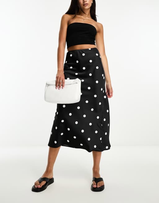 ASOS DESIGN – Svartvit, prickig och diagonalskuren midikjol i satin , 4 av 4