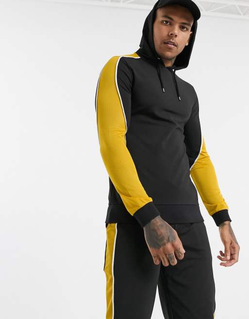 ASOS DESIGN - Ensemble avec motif color block style motorcross - Noir et jaune, 2 de 3