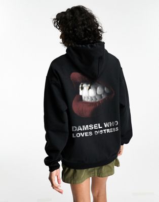 ASOS DESIGN oversized hoodie with damsel who loves distress graphic in black - ASOS Price Checker