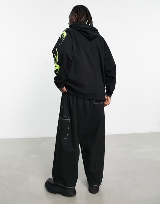 ASOS DESIGN - Sweat à capuche ultra-oversize à fermeture éclair avec imprimé tatouage fluo sur les manches - Noir, 2 de 4