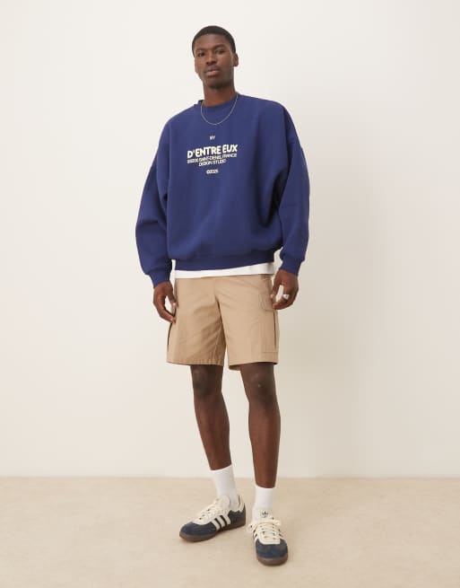 ASOS DESIGN oversized sweatshirt with chest print in navy