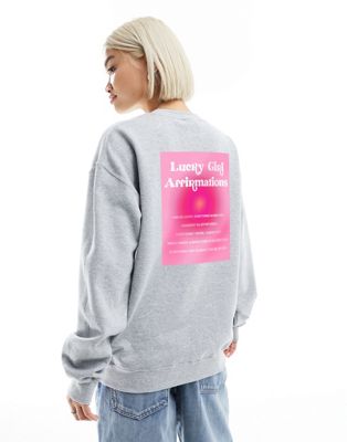 ASOS DESIGN sweatshirt with lucky girl affirmations graphic in grey marl - ASOS Price Checker