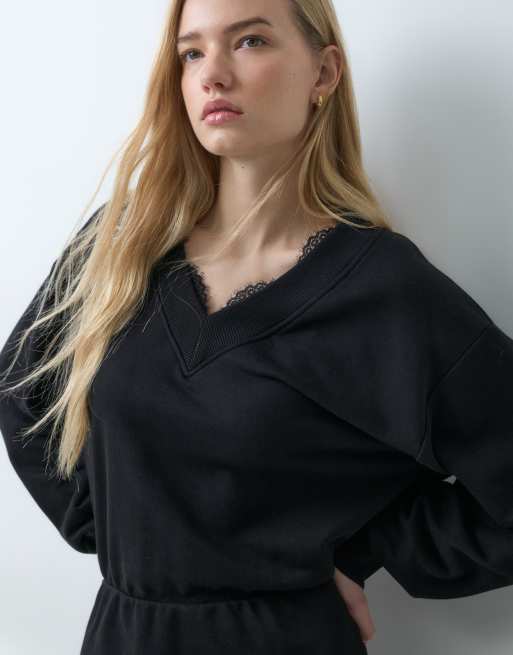 ASOS DESIGN Sweat-Minikleid mit Spitzenbesatz und V-Ausschnitt in Schwarz, 4 von 5