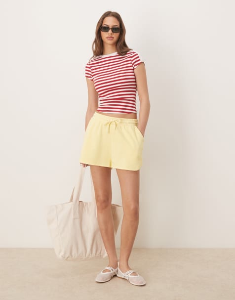 ASOS DESIGN sweat runner short in washed lemon - view 1