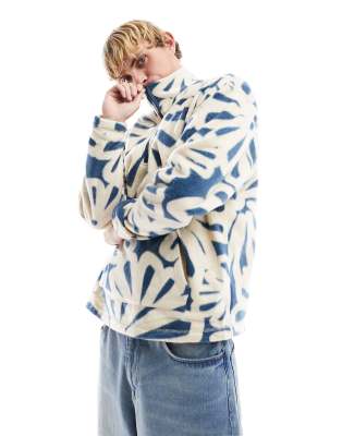 ASOS DESIGN - Sweat-shirt oversize demi-zipé en polaire avec imprimé fleur sur l'ensemble-Multicolore