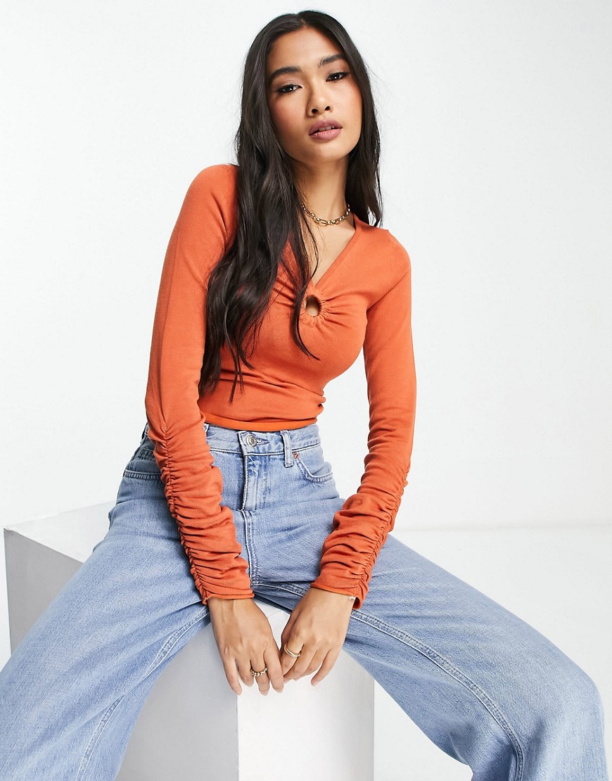 ASOS DESIGN sweater with ring detail and ruched sleeves in orange