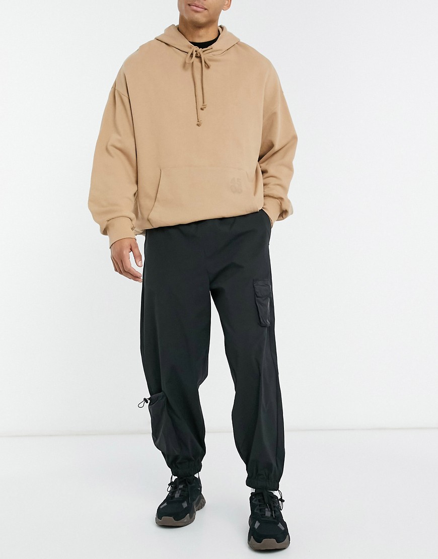 ASOS DESIGN sweatpants with 3D pockets in black