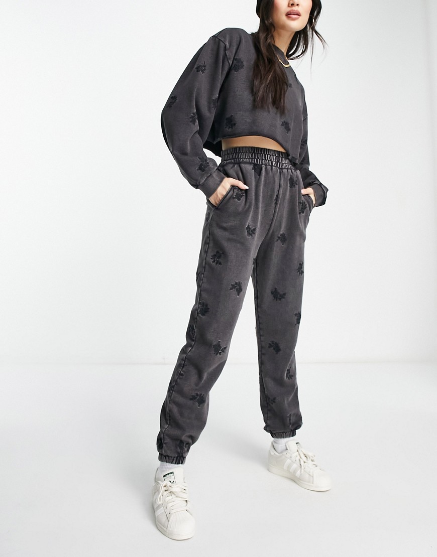 ASOS DESIGN sweatpants with floral embroidery in washed black - part of a set