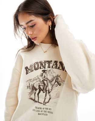 ASOS DESIGN - Sweatshirt in Ecru mit angerauter Rückseite und „Montana"-Grafikprint-Weiß