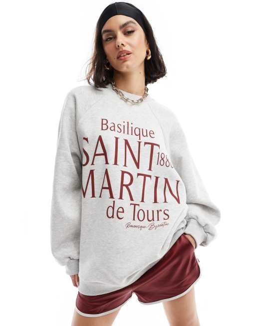 ASOS DESIGN Sweatshirt in meliertem Eisgrau mit Raglanarmeln und Saint Martin Grafikprint