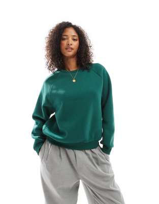 ASOS DESIGN - Sweatshirt in Tannengrün mit Raglanärmeln