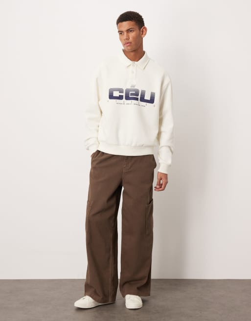 ASOS DESIGN - Sweatshirt met polokraagje, ruimvallende pasvorm en print in crème, 2 van 5