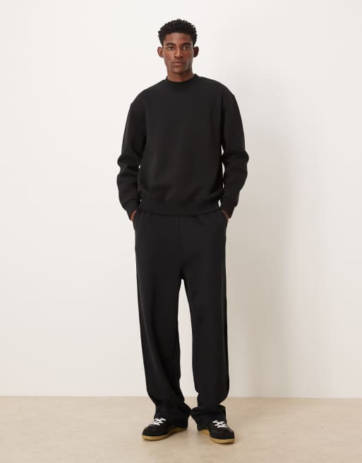 ASOS DESIGN - Sweatshirt met ruimvallende pasvorm en souvenirprint in zwart, 2 van 5
