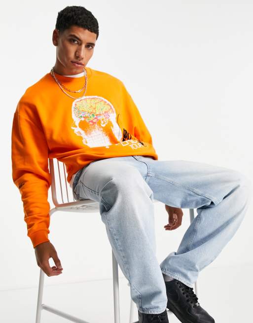 ASOS DESIGN sweatshirt with ASAP Ferg prints in orange