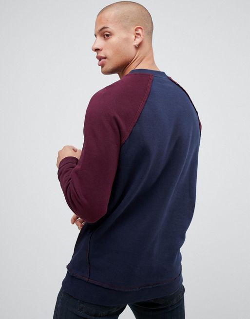 ASOS DESIGN sweatshirt with contrast raglan sleeves and raw edge