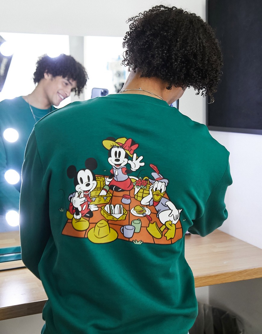 ASOS DESIGN sweatshirt with Disney Mickey Mouse prints in green