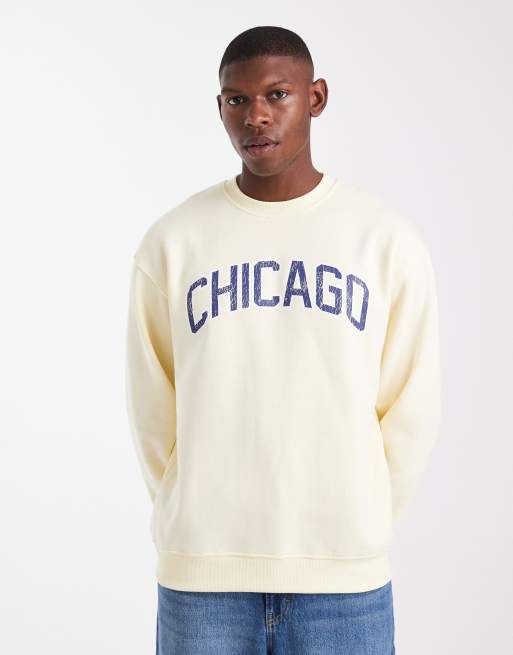 ASOS DESIGN sweatshirt with distressed text embroidery in pale yellow