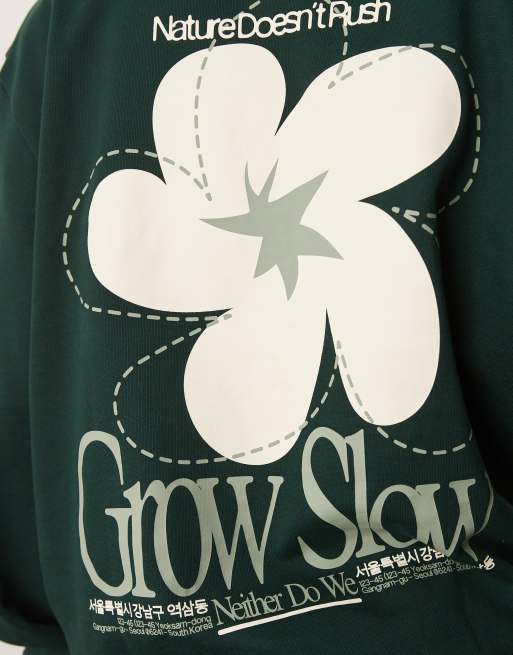 ASOS DESIGN sweatshirt with floral print in green