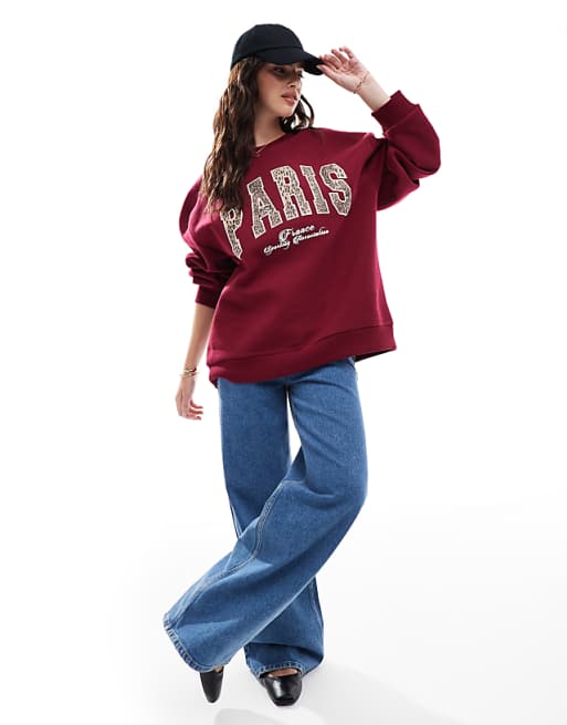 ASOS DESIGN sweatshirt with leopard paris graphic in ASOS DESIGN sweatshirt with leopard paris graphic in