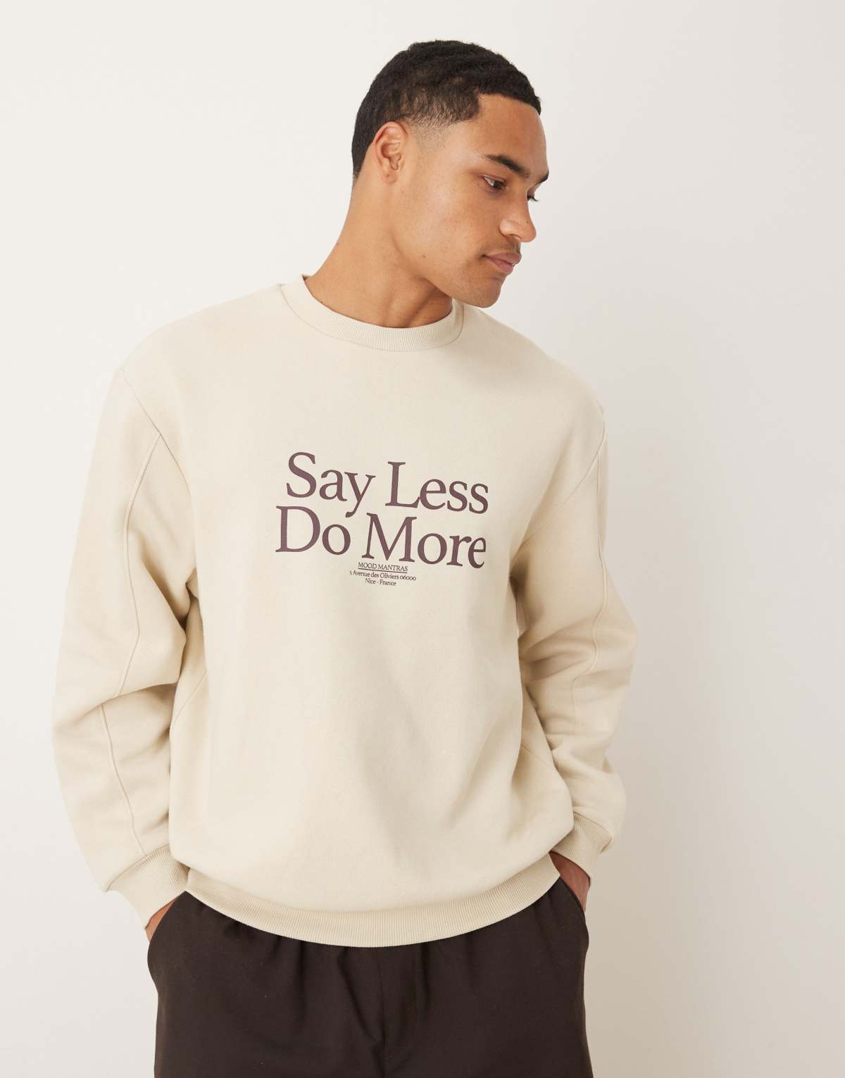ASOS DESIGN sweatshirt with text print in beige