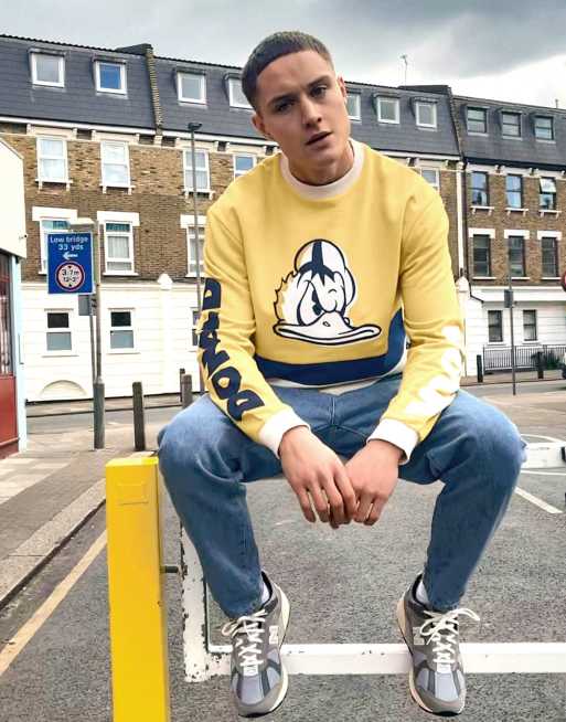 ASOS DESIGN sweatshirt with vintage Disney Donald Duck print in