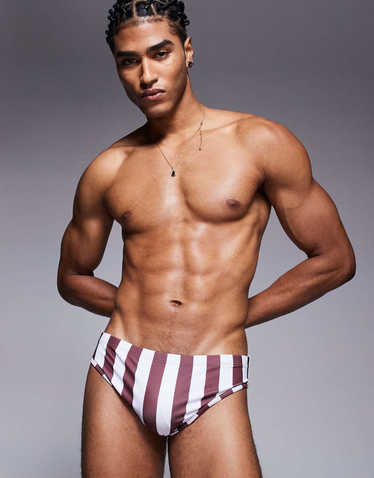 ASOS DESIGN swim brief in burgundy and white stripe