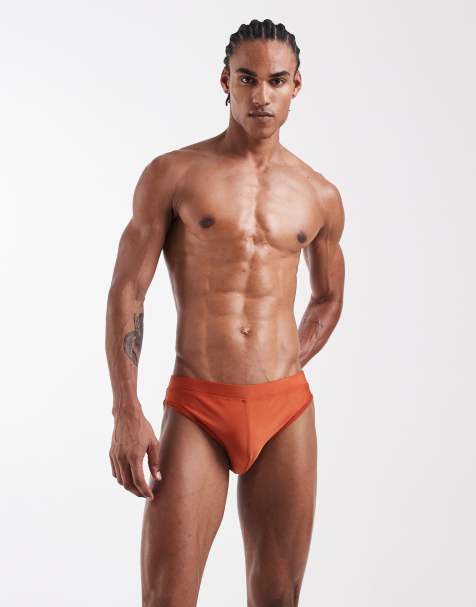 ASOS DESIGN swim briefs in rust orange - view 1